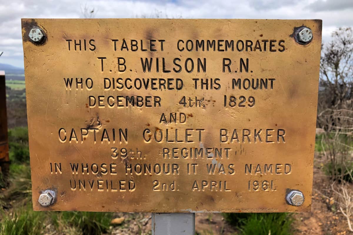Brass plaque describing the discovery of the mount by TB Wilson