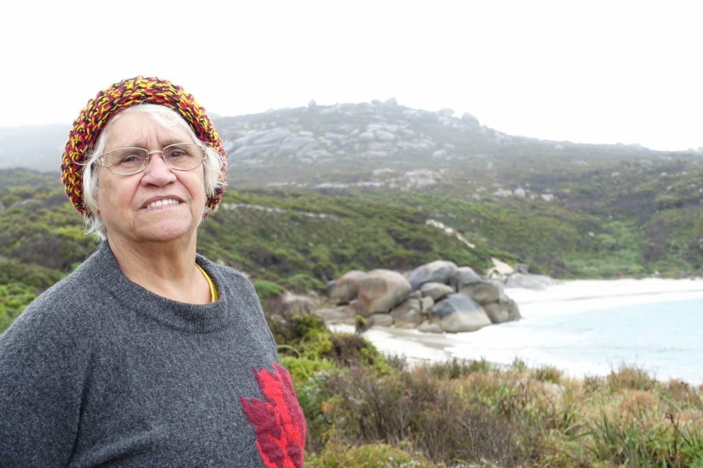 Aunty Carol standing in the bush on the coastline Boodja at Betty's Beach, east of Albany.