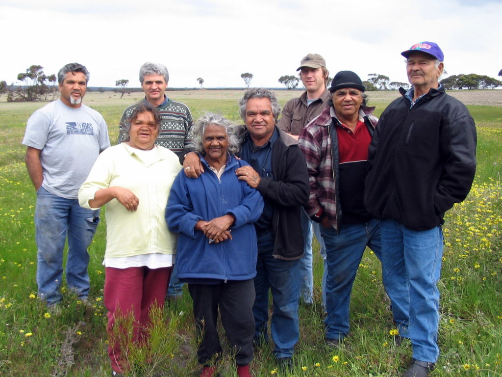 Group image of 
 Eugene Eades, Keith Bradby and archaeologist David Guilfoyle in 2005 with the first group of Elders invited to Nowanup after its purchase