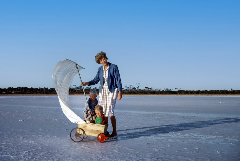 Image of Kingsley, in the cart, with his mother Kaye and brother Bevan, on a natural salt lake at the Vaux’s Ongerup farm. Picture: Donald Vaux.