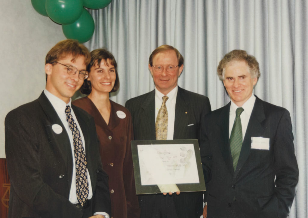 Image of the 1996 official opening of the Environmental Defenders Office WA with (L-R) solicitor Michael Bennett; co-ordinator Margaret Robertson; Commonwealth Attorney-General Daryl Williams; and EDO convenor Michael Barker.